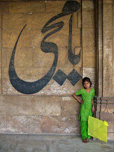 Collecting fallen kites (patang) in the Jama Masjid (Friday Mosque) at Manek Chowk in the Old City. Photo by Meena Kadri/Flickr.com