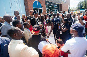 Protest at Ferguson, MO police department. Photo courtesy of Wikimedia Commons.