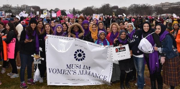 A large group of the Muslim Women’s Alliance Marchers with the White House behind them in the background. Image source: MWA