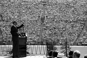 Evangelist Billy Graham preaches one Sunday to more than 40,000 worshipers at the Los Angeles Memorial Coliseum. (UCLA