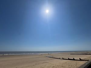 Sun rising over sand