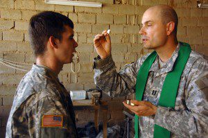 U.S. Army Capt. John Barkemeyer, a chaplain, conducts mass for Soldiers on a remote contingency operating base in Ramadi, Iraq, Sept. 20, 2007. (U.S. Army photo by Spc. Kieran Cuddihy) (Released)