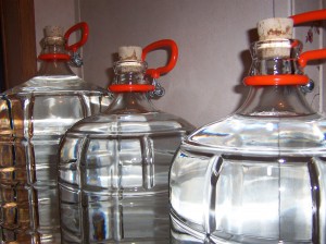 The glass carboys I use to gather wild spring water. Photo by the author.