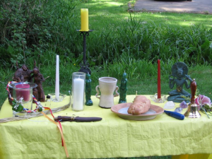 "Wiccan altar (0)" by RaeVynn Sands, Flickr user cronewynd - originally uploaded to Flickr by RaeVynn Sands as Beltane Altar. Licensed under CC BY 2.0 via Wikimedia Commons - http://commons.wikimedia.org/wiki/File:Wiccan_altar_(0).png#/media/File:Wiccan_altar_(0).png
