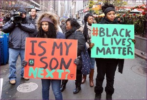 Protestors carrying placards at a Black Lives Matter demonstration in New York City 28 November 2014, 12:50:28 CC-BY-SA 2.0 Author: The All-Nite Images
