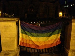 Rainbow flag. Oxford, UK vigil for Orlando. Photo by Yvonne Aburrow. CC-BY-SA 4.0