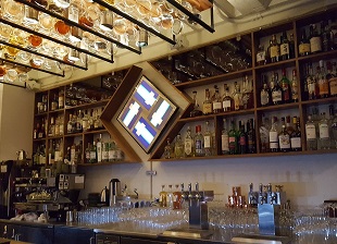 The bar at the Interval and its never-repeating digital art.