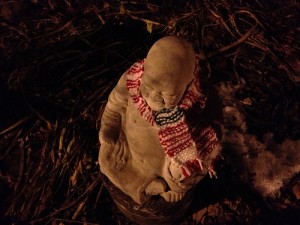 Buddha statue with a scarf on