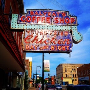 Saturated color highlights the sign's decay.