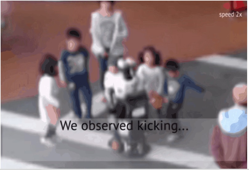 kids kicking robot