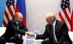 Trump and Putin shake hands