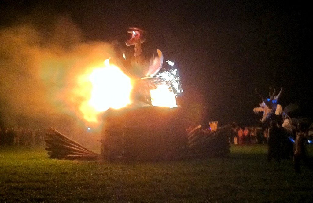 Bonfire lighting Sirius Rising Festival 2014. Photo by Lilith Dorsey.