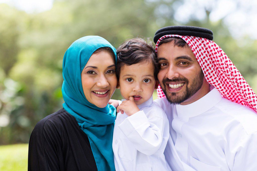 young Arabian family portrait outdoors