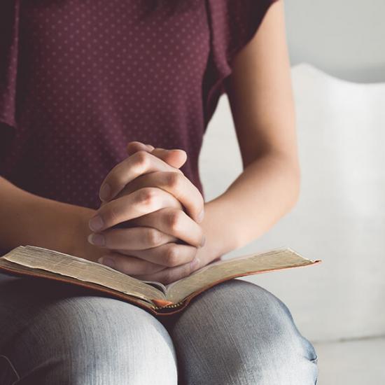 Faith-Christian-Woman-Pray-Bible-Hands_credit-Shutterstock
