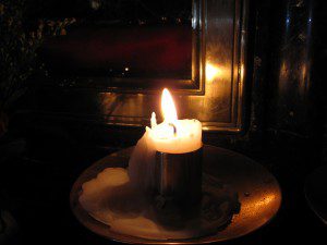 A candle inside the Holy Sepulcher