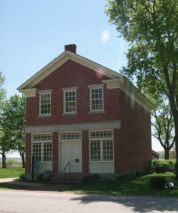 Red brick store in Nauvoo, public domain.
