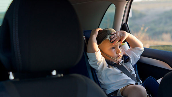 boy in car seat