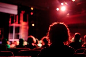 Woman looks at stage