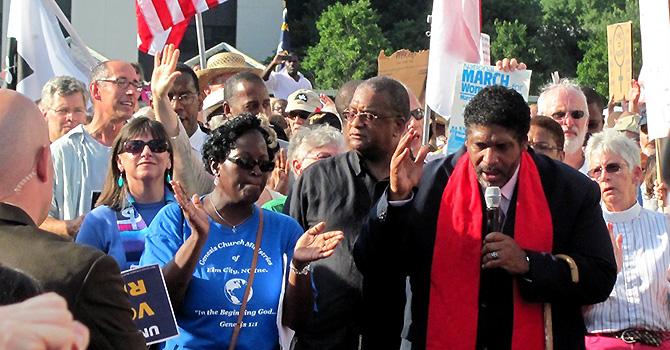 The Rev. Dr. William J. Barber II speaking at a Moral Monday rally. Creative Commons: Flickr / Twbuckner