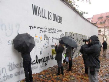 The Lennon Wall, a couple of days after it was painted white.