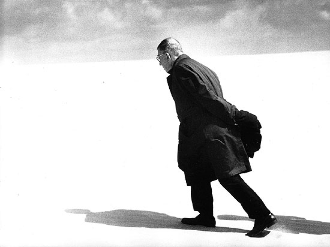 Sartre walking away from atheism.