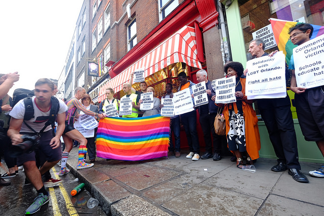 (Source: Alisdare Hickson, Photo: The Rainbow Vigil. Peter Tatchell and other activists at London's vigil in memory of the victims of Orlando's gay nightclub terror attack; Source: Flickr, CC BY-SA 2.0)