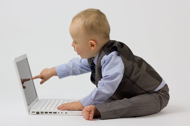 Oh look, cute baby [click, click, click] (Paul Inkles, Business Baby Pointing, 20111; Source: Flickr: CC by 2.0)
