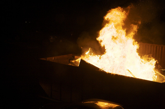 Ben Watts, Fire in Dumpster, 2009; Source: Flickr, CC BY 2.0. 