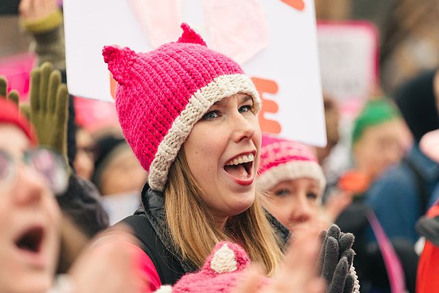 (A woman cheers during the Madison WI rally for the Women's March on January 21, Author: Amandalynn Jones; Source: Wikimedia Commons, CC BY-SA 4.0).