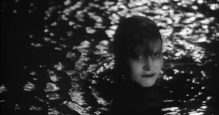 Someone coming out of the water