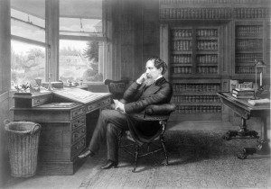 Charles Dickens at Publwriting Desk. Public domain image courtesy of Publicdomainpictures.net.