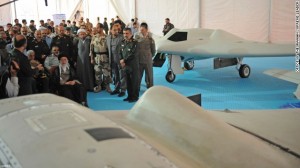 Khamenei posing with the replica of an American dome, trying to look tough.