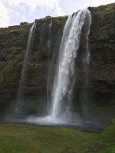 Image: a tall, thin waterfall with a smaller fall next to it.