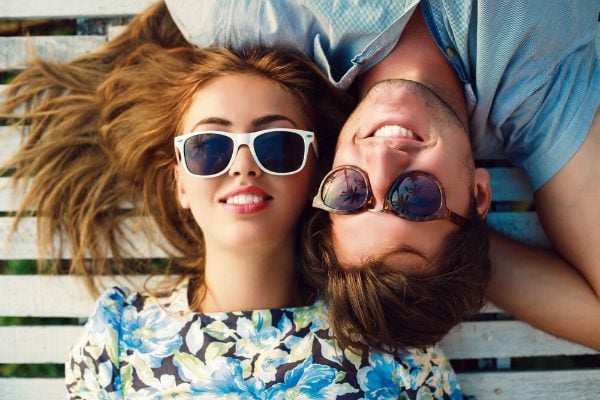 couple smiling sunglasses