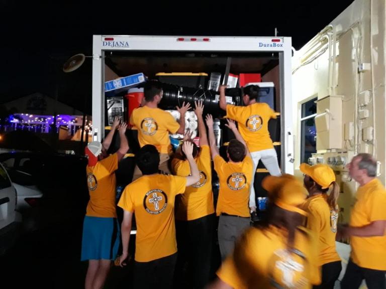 Scientology Volunteer Ministers of Clearwater, Florida, load a 16-foot truck with water, food, emergency kits and other needed supplies and send it off to Boca Raton where it was loaded onto a ship and tansported to Freeport to distribute to victims of Hurricane Dorian.