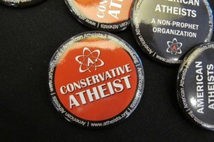 A red button with the words "Conkservative Atheist" was handed out by American Atheists at a 2014 meeting of the Religion Newswriters Conference. Photo by Barbara Newhall