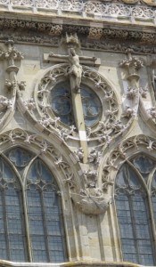 Crucifixion of Jesus hangs over the entrance to the 15th-century, high gothic Regensburg Cathedral, Germany. Photo by Barbara Newhall