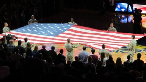 The American flag is displayed at a Warriors basketball game in Oakland, CA. Last-minute gifts. Photo by Barbara Newhall