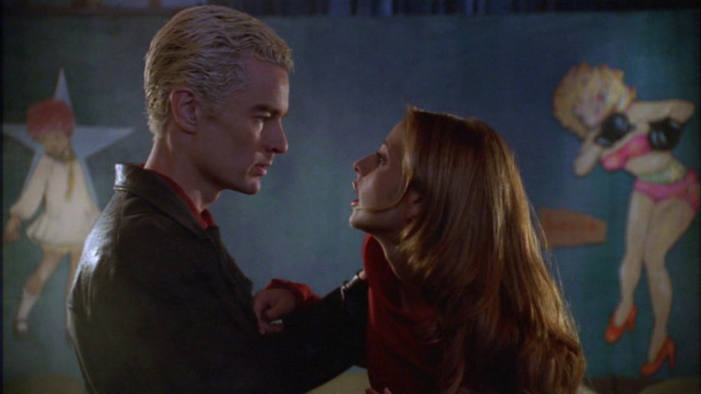 Buffy starts dancing frantically in the hopes of burning up, only for Spike to save her f...