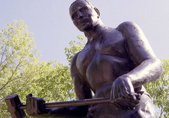 Statue of John Henry near the Big Bend Tunnel in West Virginia (Wikimedia photo by Ken Thomas)