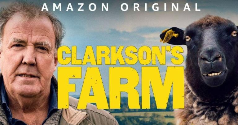 Jeremy Clarkson and a sheep flank the logo for his show 'Clarkson's Farm'