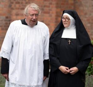 A priest and a nun walk toge