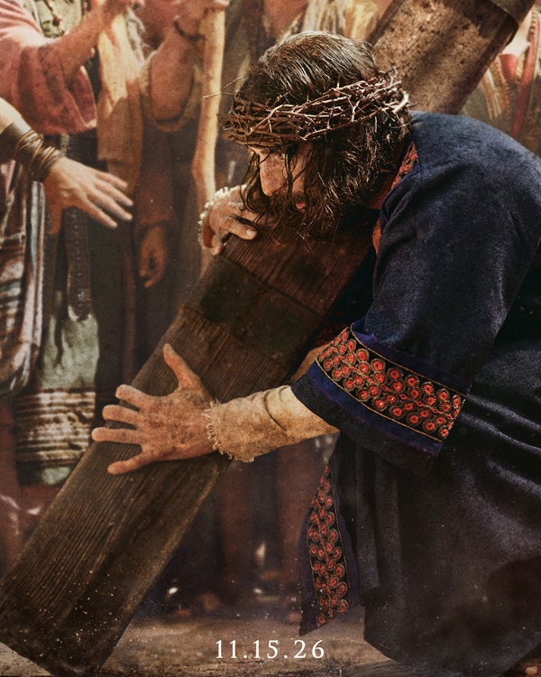 Jesus (Jonathan Roumie) is seen carrying His Cross in a scene from Season Six of 'The Chosen.'