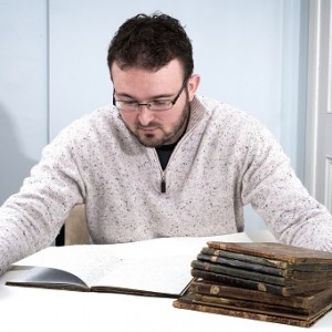 Christian George with some of Spurgeon's lost notebooks.