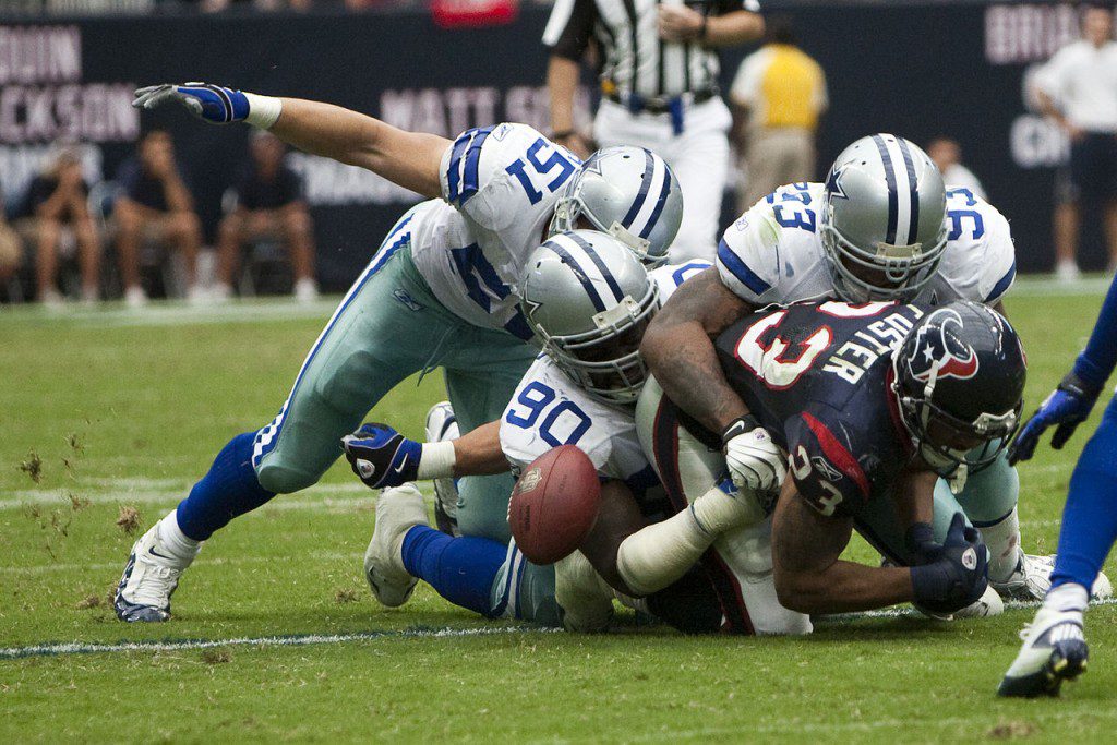 https://commons.wikimedia.org/wiki/File%3AArian_Foster_fumble.jpg; By AJ Guel (originally posted to Flickr as Fumble) [CC BY 2.0 (http://creativecommons.org/licenses/by/2.0)], via Wikimedia Commons