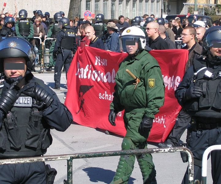 A Munich Neonazi demonstration, from Wikipedia, https://upload.wikimedia.org/wikipedia/commons/b/be/Neonazi_2.4.2005_M%C3%BCnchen_2.jpg