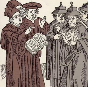 Jews and Christians disputing scripture (the Jews are wearing the poiny hats) in a 15th c. Dutch woodcut.