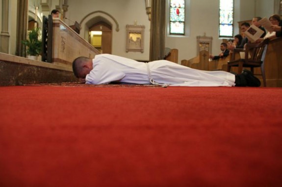 Cardinal ordains deacon on long journey to priesthood