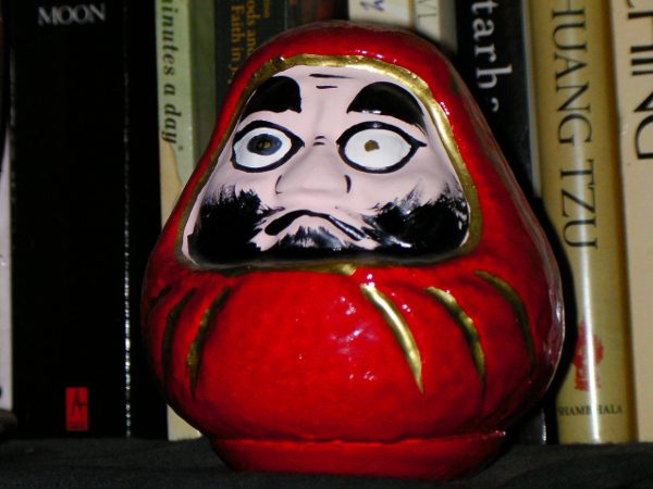 A Daruma figurine