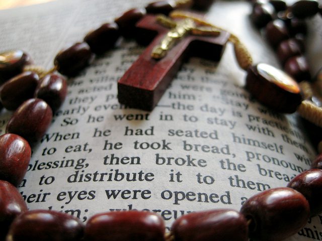 Rosary and Bible. Photo Credit: Chris Sloan.